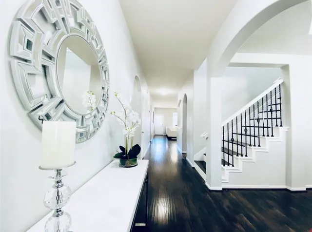 a view of entryway with wooden floor
