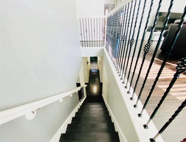 a bathroom with a sink a vanity and a mirror