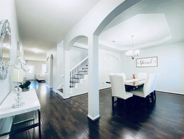 a view of dining room with furniture and window