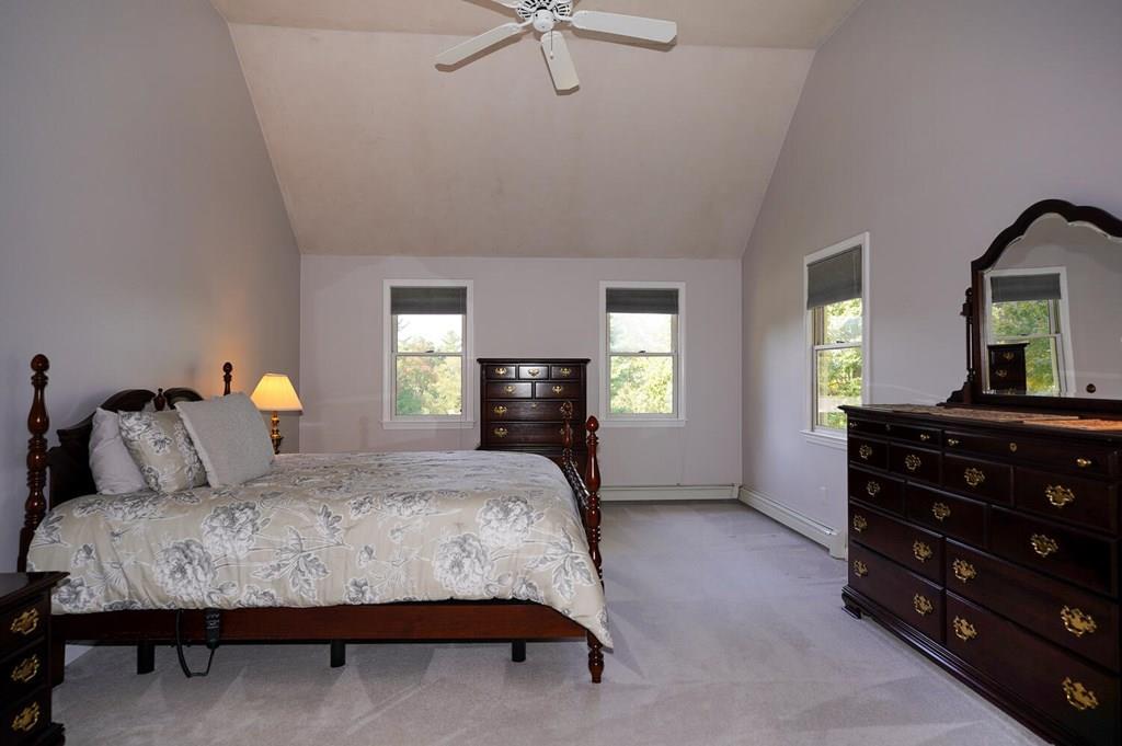 230 Simpson Road Marlborough, MA 01752 - Photo 18 of 32 a bedroom with a bed and a dresser