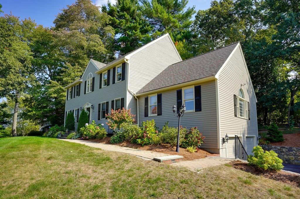 230 Simpson Road Marlborough, MA 01752 - Photo 2 of 32 a view of a house with backyard and sitting area