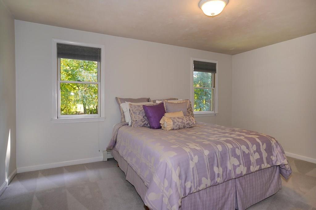 230 Simpson Road Marlborough, MA 01752 - Photo 22 of 32 a bedroom with a bed and window