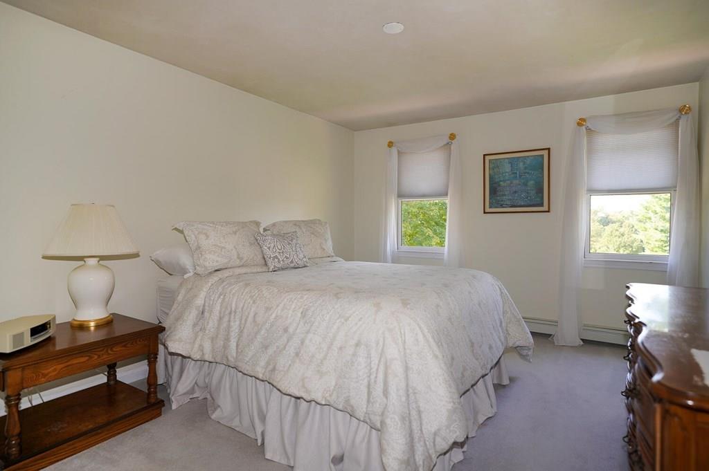 230 Simpson Road Marlborough, MA 01752 - Photo 23 of 32 a bedroom with a bed and a window