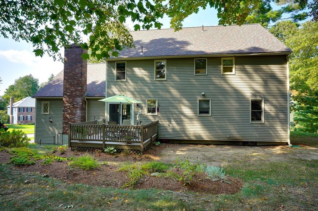 230 Simpson Road Marlborough, MA 01752 - Photo 27 of 32 a front view of a house with a garden