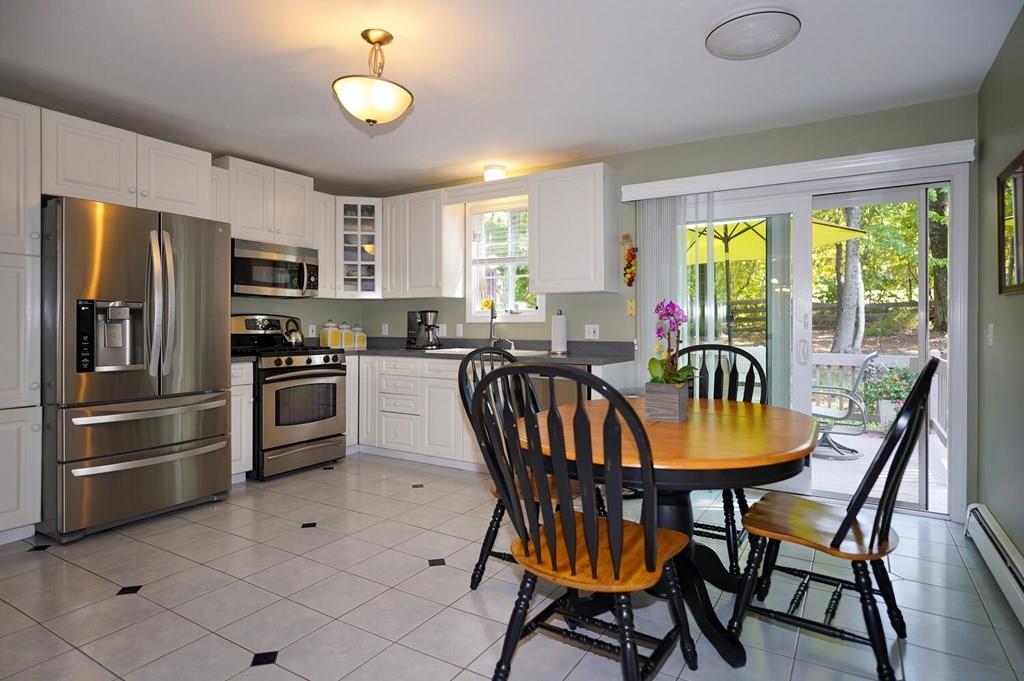230 Simpson Road Marlborough, MA 01752 - Photo 3 of 32 a view of a dining room with furniture window and outside view