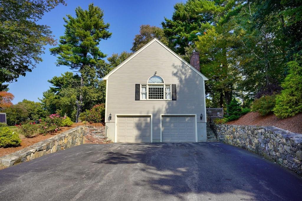 230 Simpson Road Marlborough, MA 01752 - Photo 31 of 32 a view of a house with a yard and garage