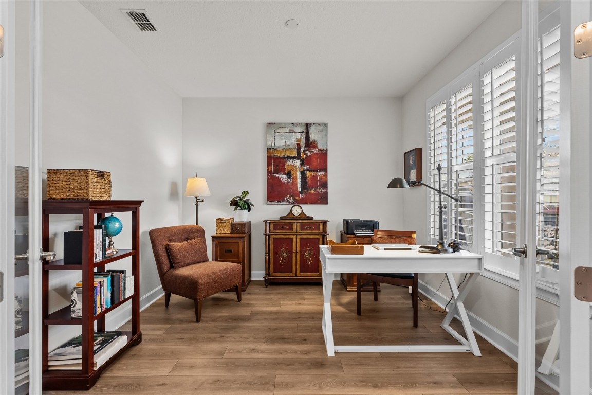 93322 Sandown Drive Fernandina Beach, FL 32034 - Photo 15 of 40 a room with furniture a rug and a window