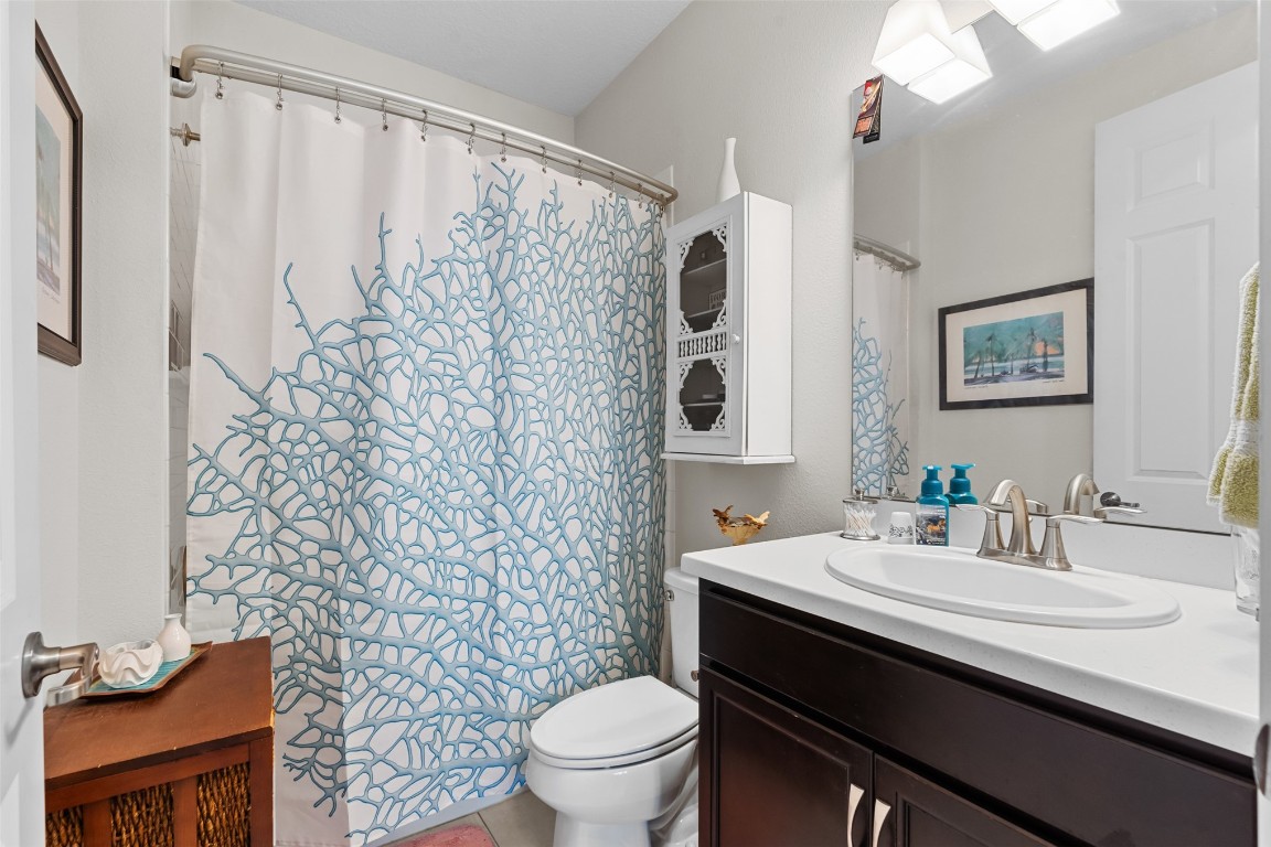 93322 Sandown Drive Fernandina Beach, FL 32034 - Photo 31 of 40 a bathroom with a sink and a mirror