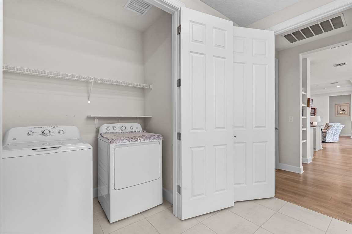 93322 Sandown Drive Fernandina Beach, FL 32034 - Photo 36 of 40 a utility room with dryer and washer