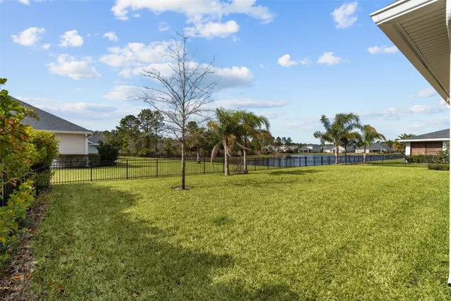 a view of a golf course with a big yard