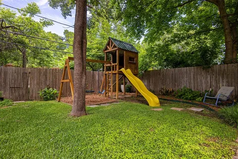 a view of a house with a park