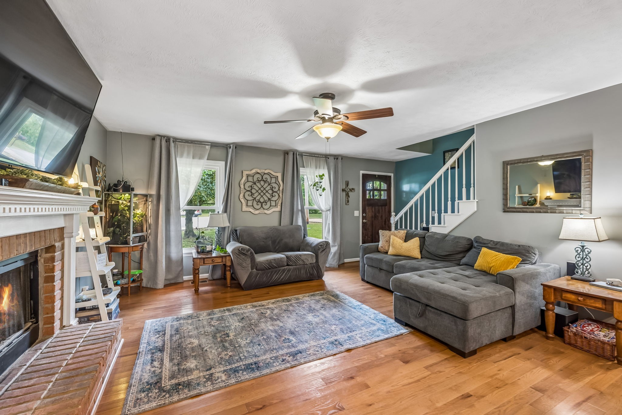 3516 Laurel Court Murfreesboro, TN 37129 - Photo 11 of 65 a living room with furniture and a fireplace