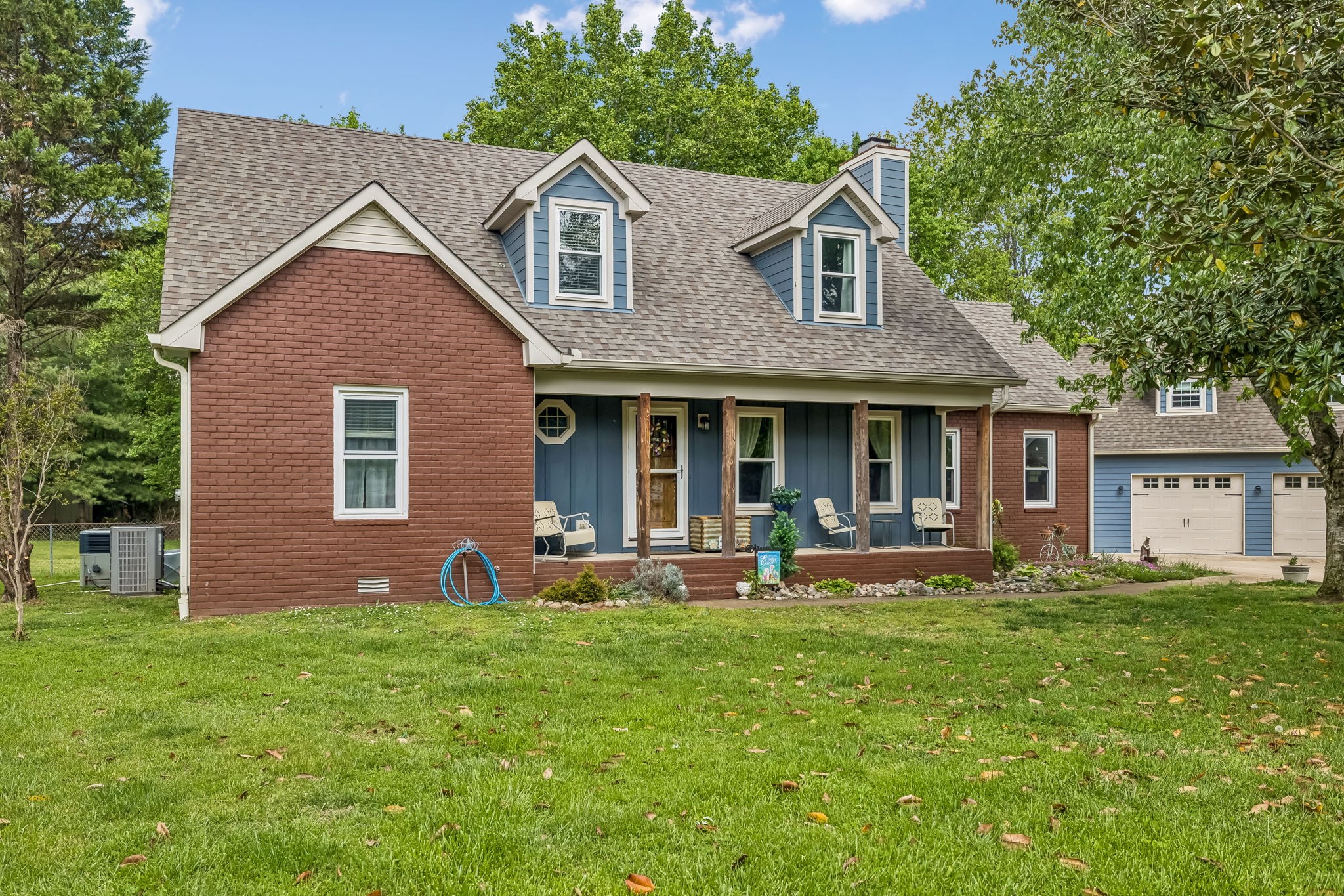 3516 Laurel Court Murfreesboro, TN 37129 - Photo 2 of 65 a front view of a house with a yard and porch