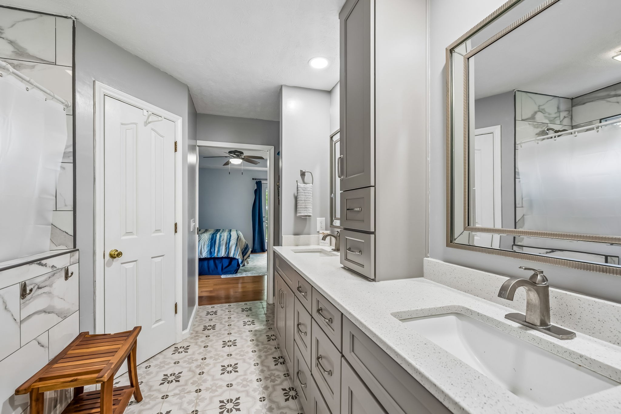 3516 Laurel Court Murfreesboro, TN 37129 - Photo 25 of 65 a bathroom with a sink a tub and a mirror