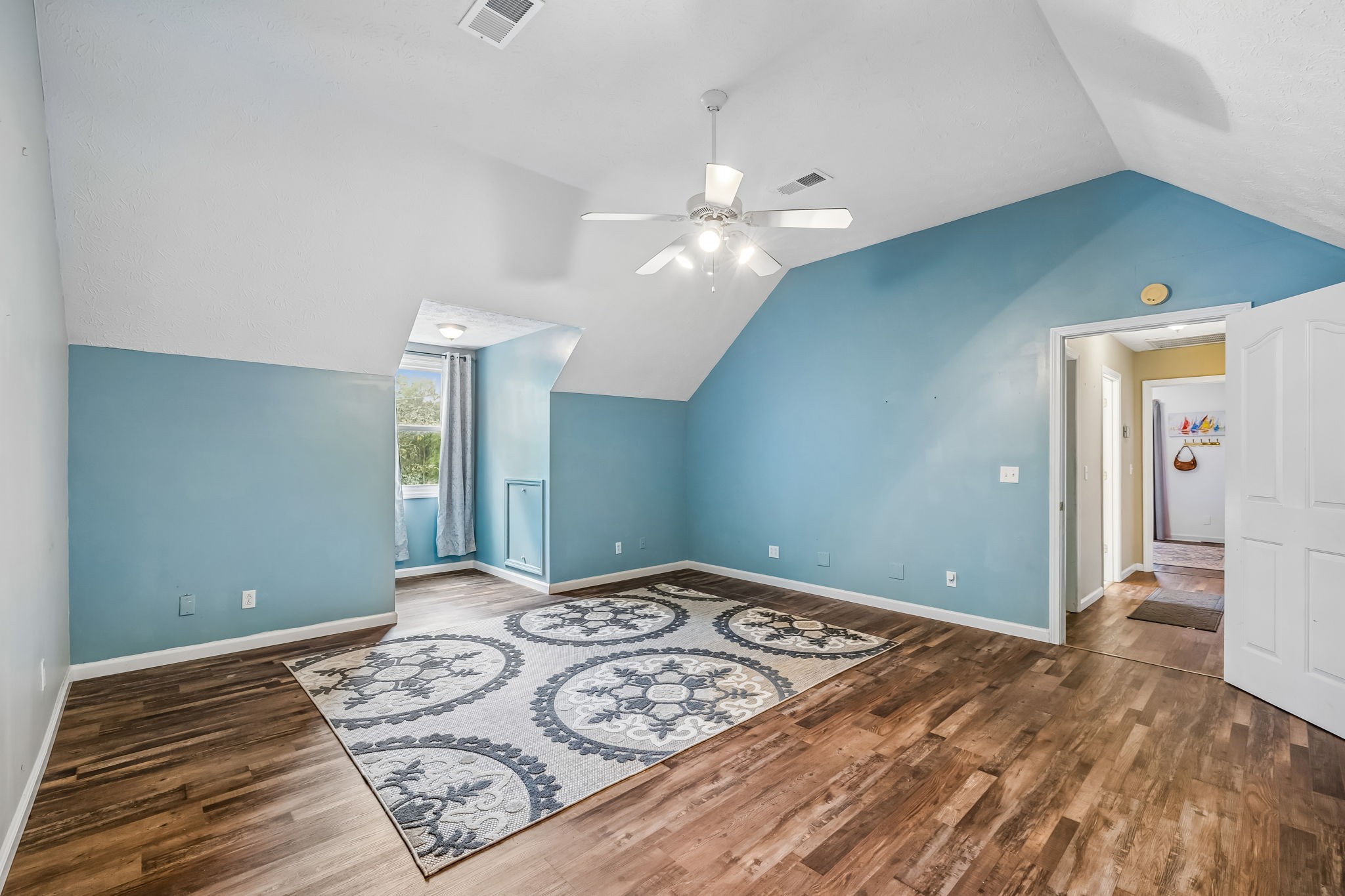 3516 Laurel Court Murfreesboro, TN 37129 - Photo 33 of 65 a bedroom with a large bed and a chandelier