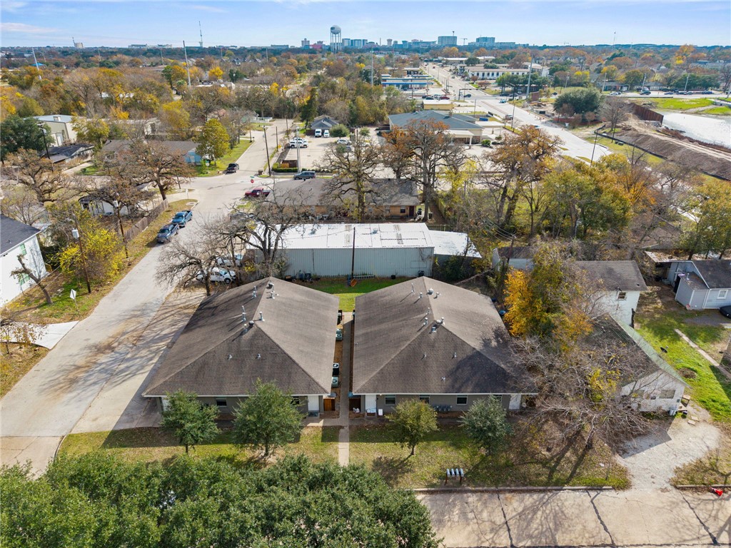 105-107 Davis Street Bryan, TX 77801 - Photo 14 of 14 an aerial view of residential houses with outdoor space