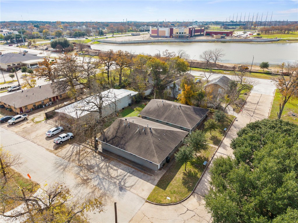 105-107 Davis Street Bryan, TX 77801 - Photo 2 of 14 a view of a lake with outdoor space