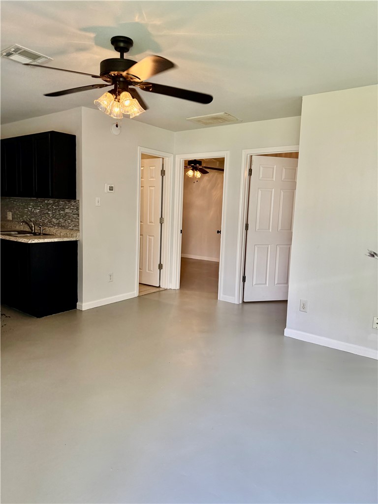 105-107 Davis Street Bryan, TX 77801 - Photo 9 of 14 a view of entryway and kitchen