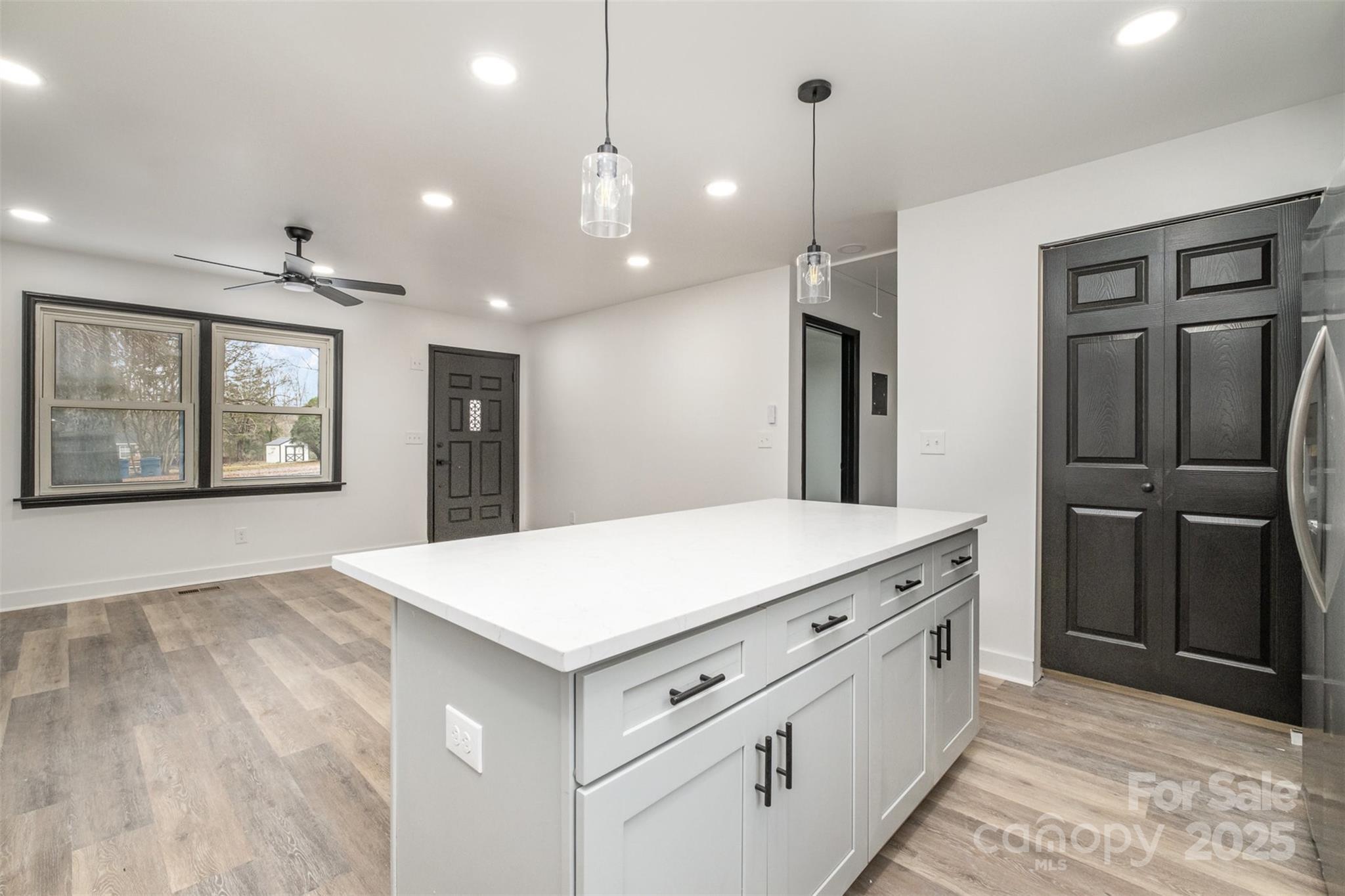 5674 Alan D Good Lane Conover, NC 28613 - Photo 11 of 21 a kitchen with white cabinets and refrigerator