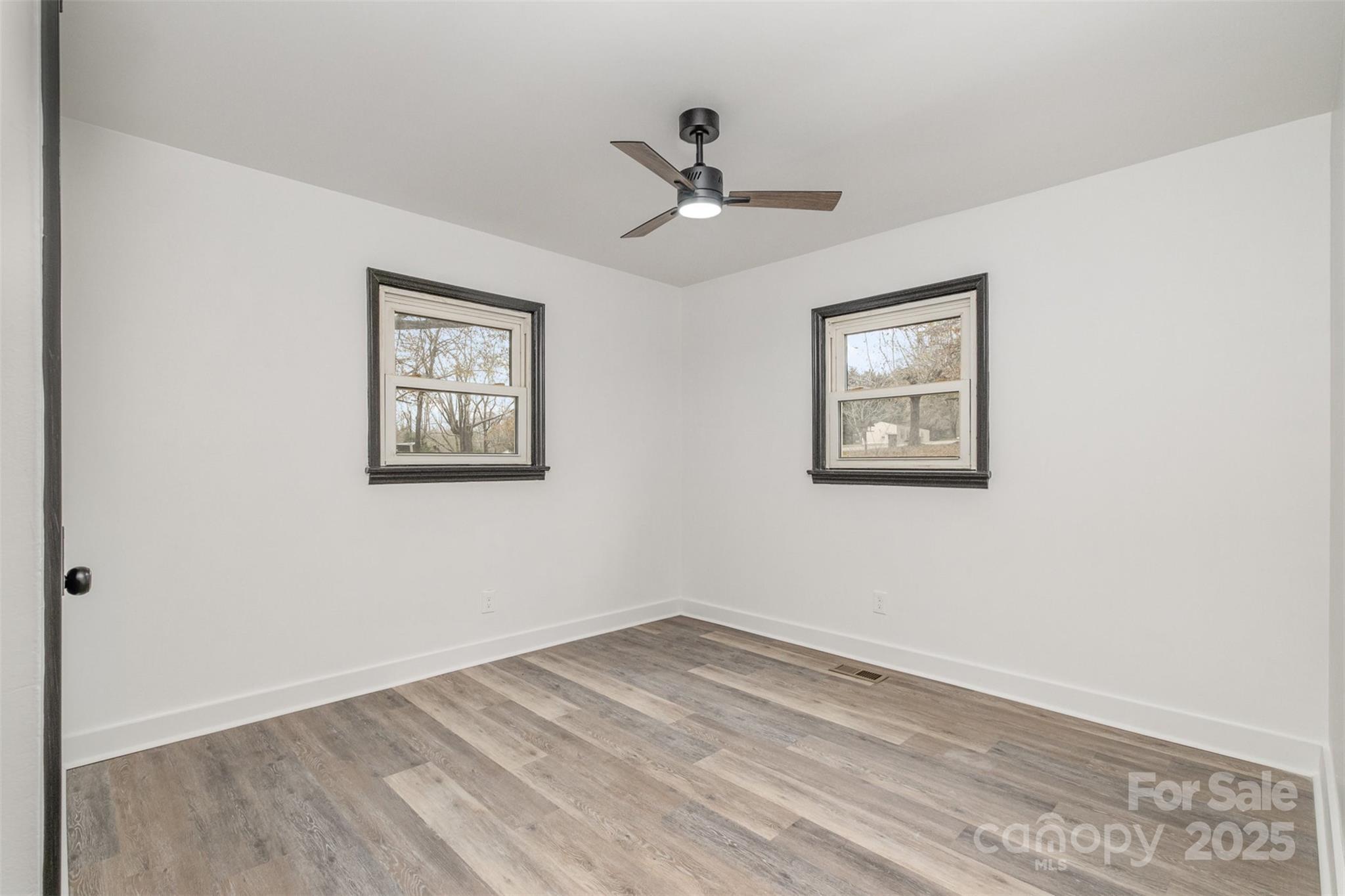5674 Alan D Good Lane Conover, NC 28613 - Photo 13 of 21 a view of empty room with wooden floor