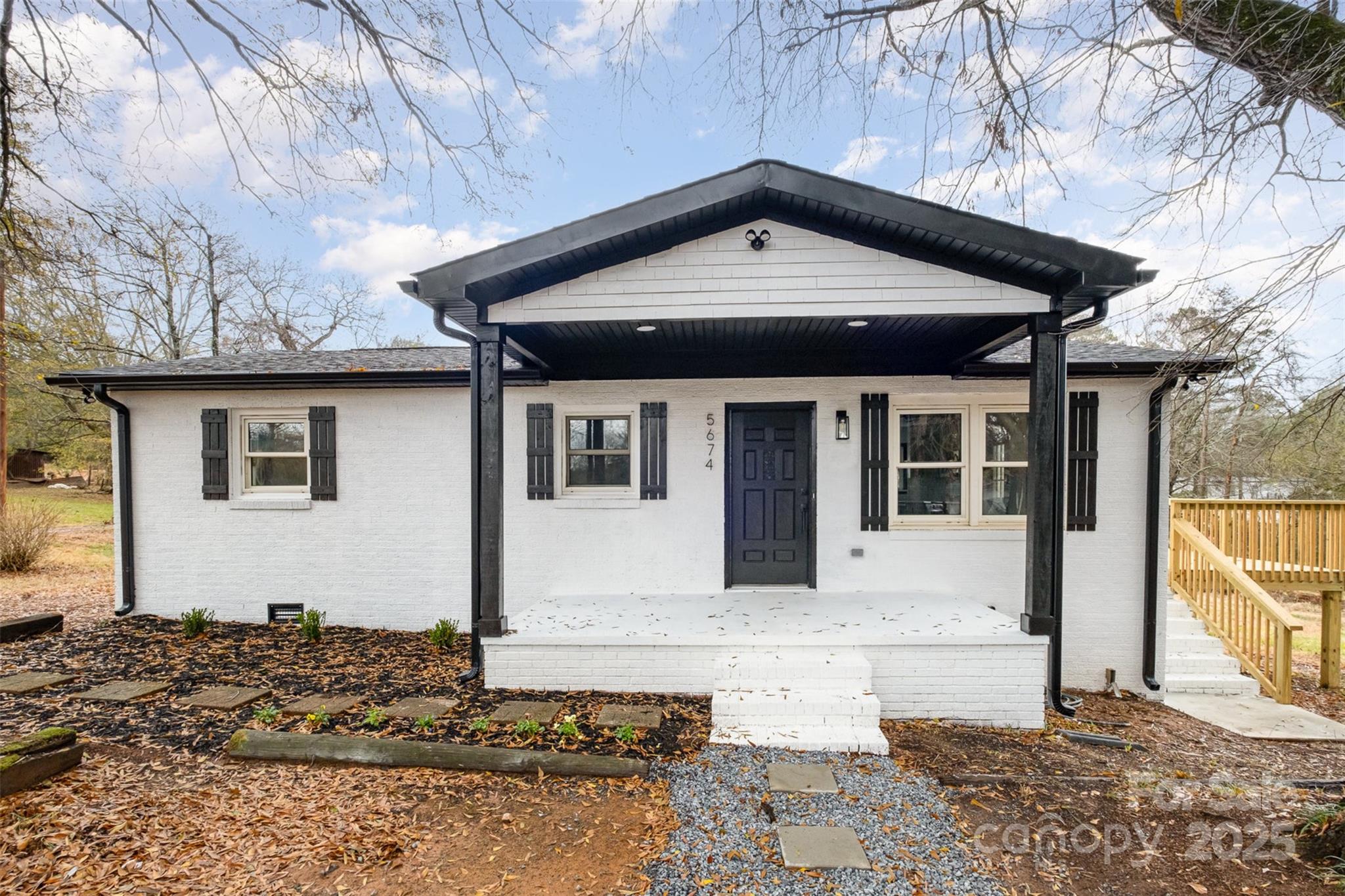 5674 Alan D Good Lane Conover, NC 28613 - Photo 4 of 21 a front view of a house with a yard