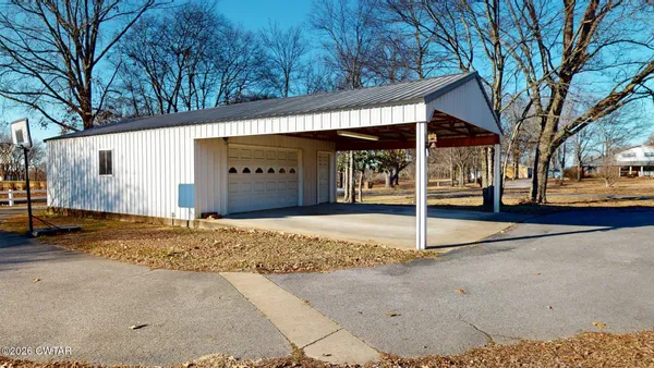 a house with trees in front of it