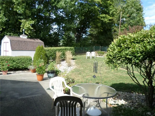 a view of a patio in backyard