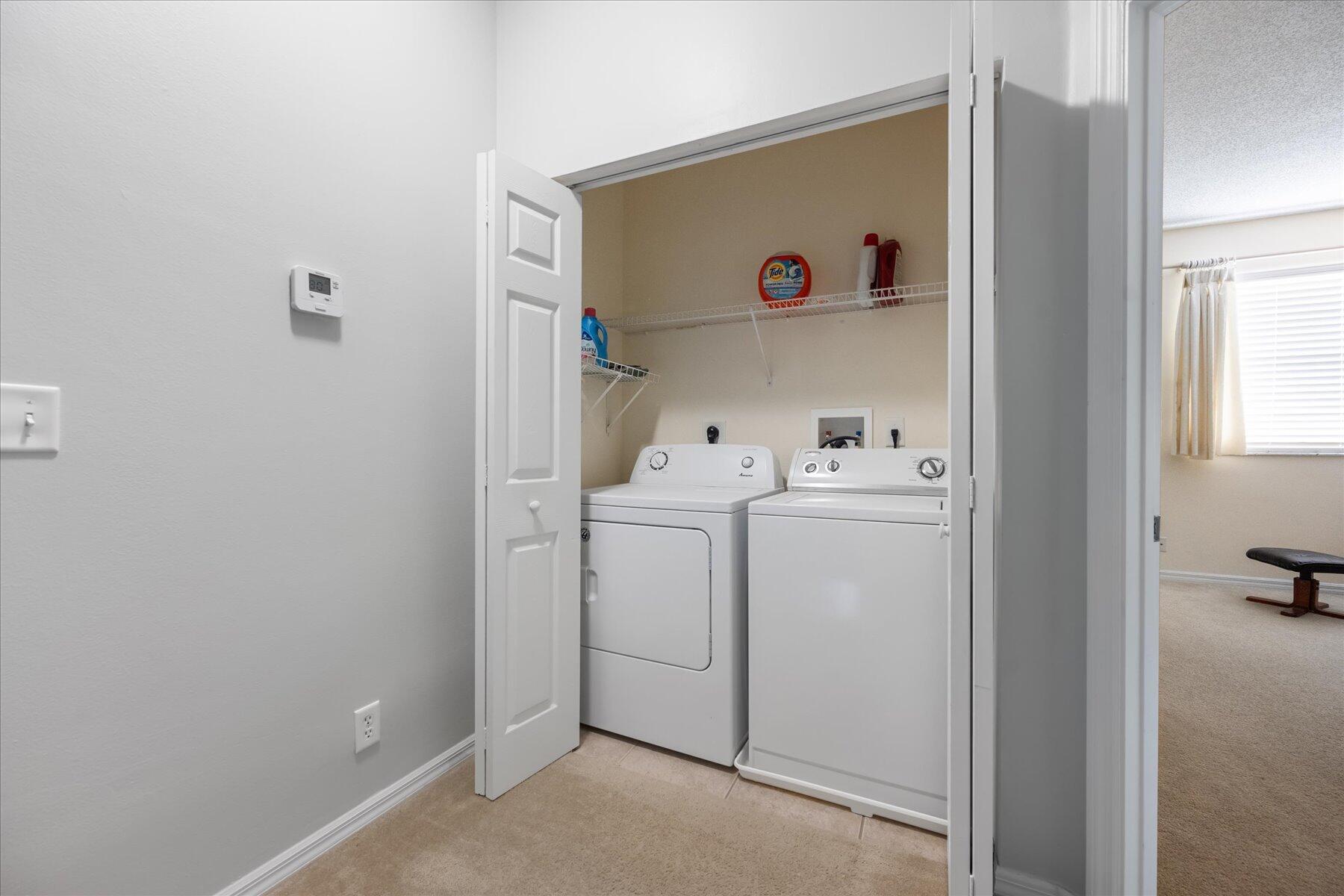 112 Lighthouse Circle, Unit G Tequesta, FL 33469 - Photo 25 of 27 a room with storage and utility