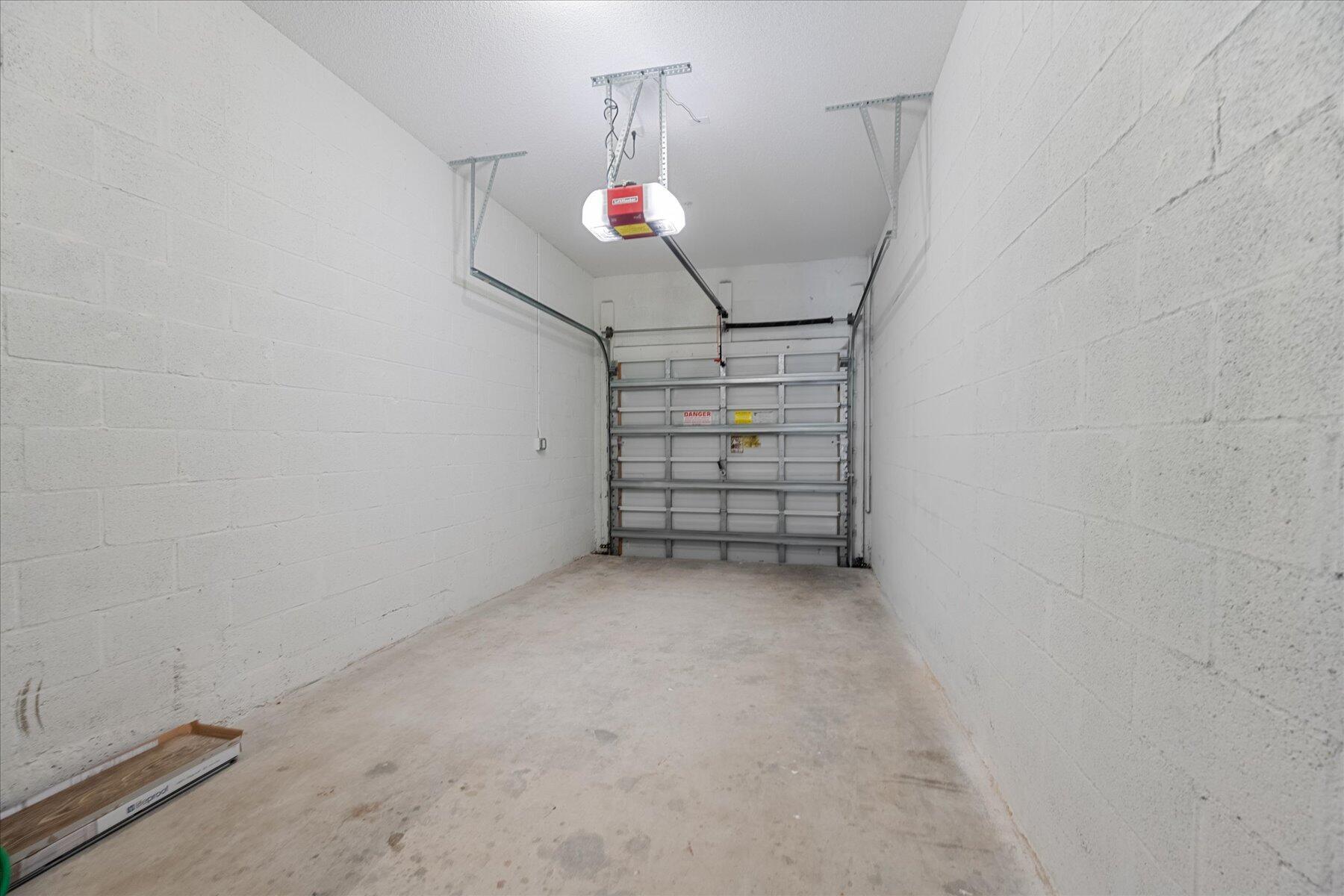 112 Lighthouse Circle, Unit G Tequesta, FL 33469 - Photo 26 of 27 wooden floor in an empty room