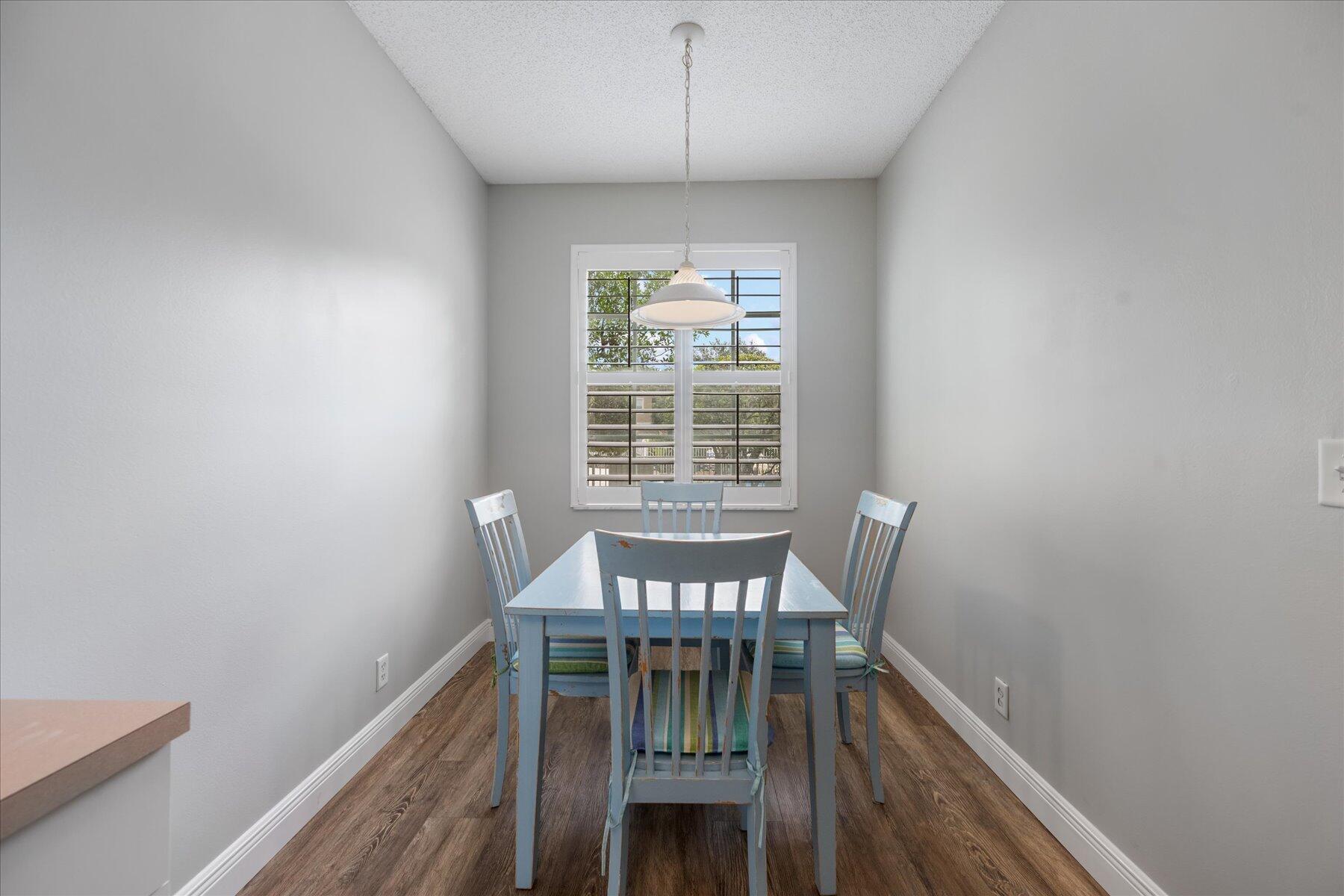112 Lighthouse Circle, Unit G Tequesta, FL 33469 - Photo 10 of 27 a view of a hallway with an empty room