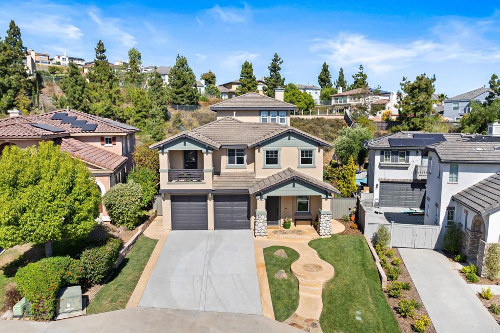 1653 Reflection Street San Marcos, CA 92078 - Photo 56 of 68 a aerial view of a house with swimming pool garden and patio