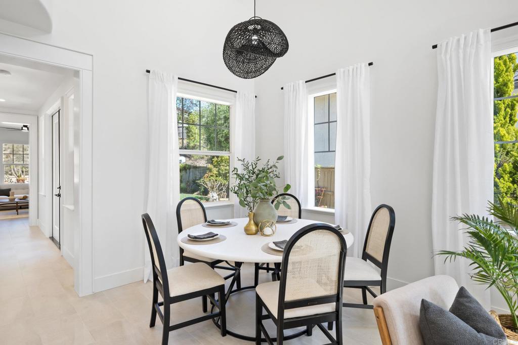 1653 Reflection Street San Marcos, CA 92078 - Photo 8 of 68 a dining room with furniture and window