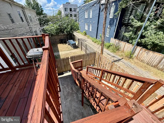 a view of balcony with furniture