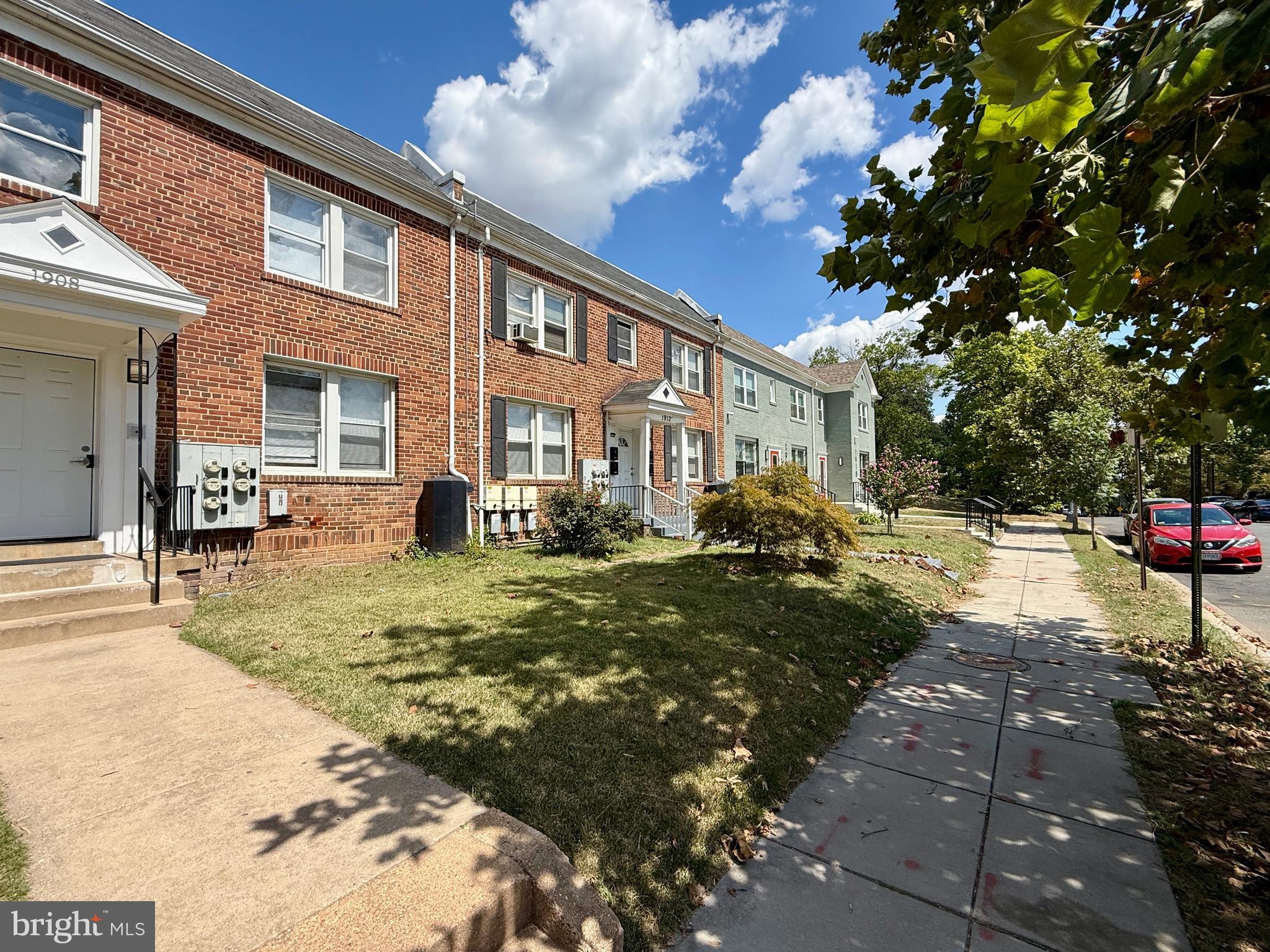 1908 M Street Northeast Washington, DC 20002 - Photo 18 of 20 a front view of a house with garden