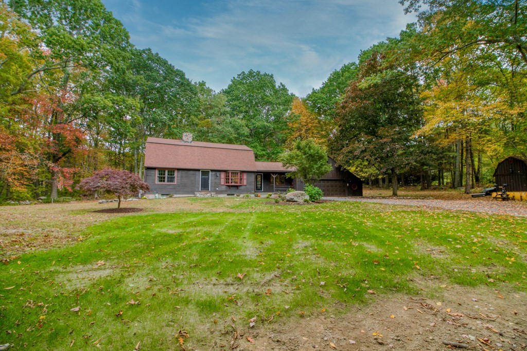 27 Thayer Road Monson, MA 01057 - Photo 2 of 39 a view of a house with a backyard