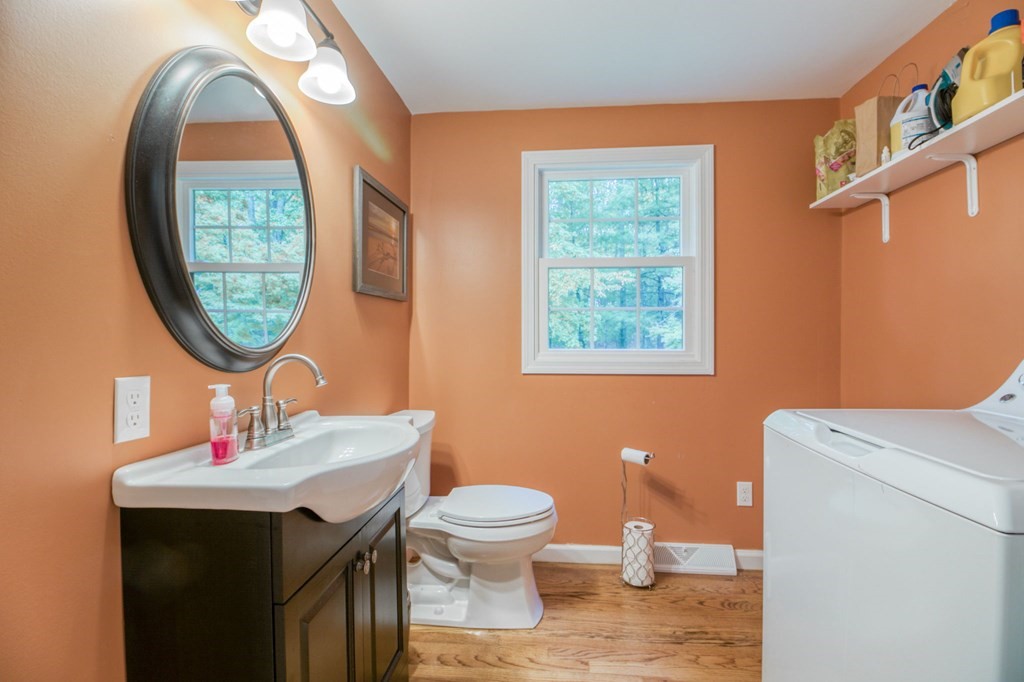 27 Thayer Road Monson, MA 01057 - Photo 23 of 39 a bathroom with a toilet a sink and a mirror