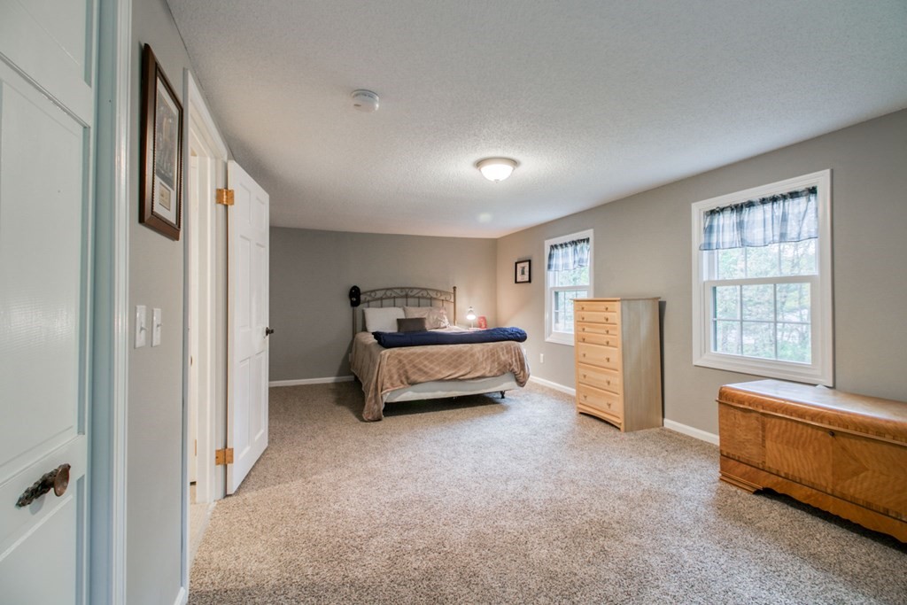 27 Thayer Road Monson, MA 01057 - Photo 24 of 39 a bedroom with furniture and a window