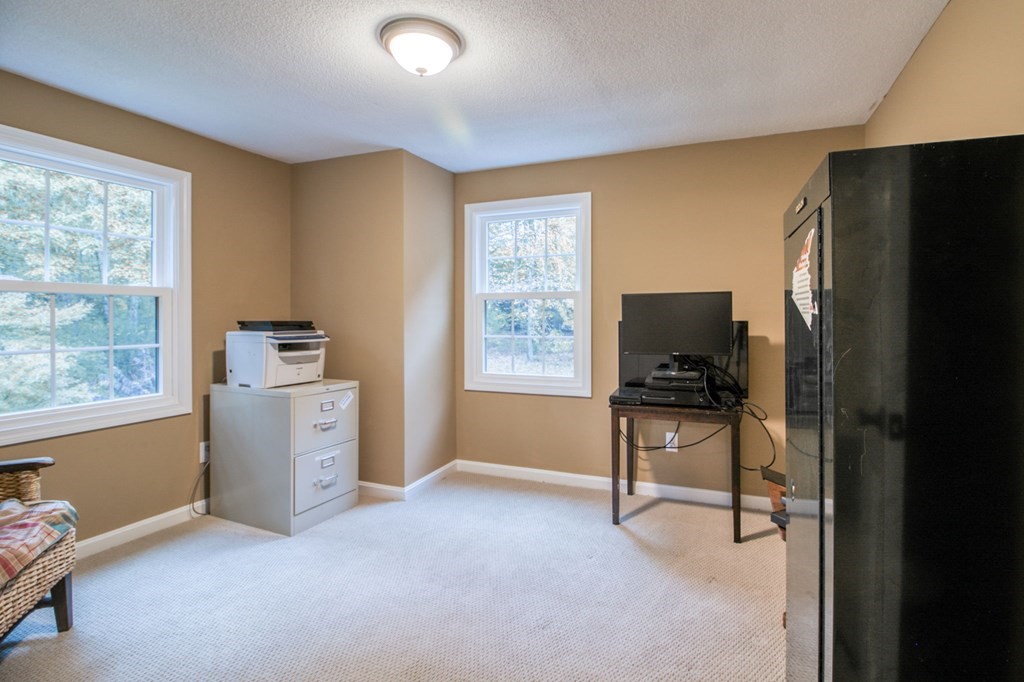 27 Thayer Road Monson, MA 01057 - Photo 28 of 39 a livingroom with furniture and a window