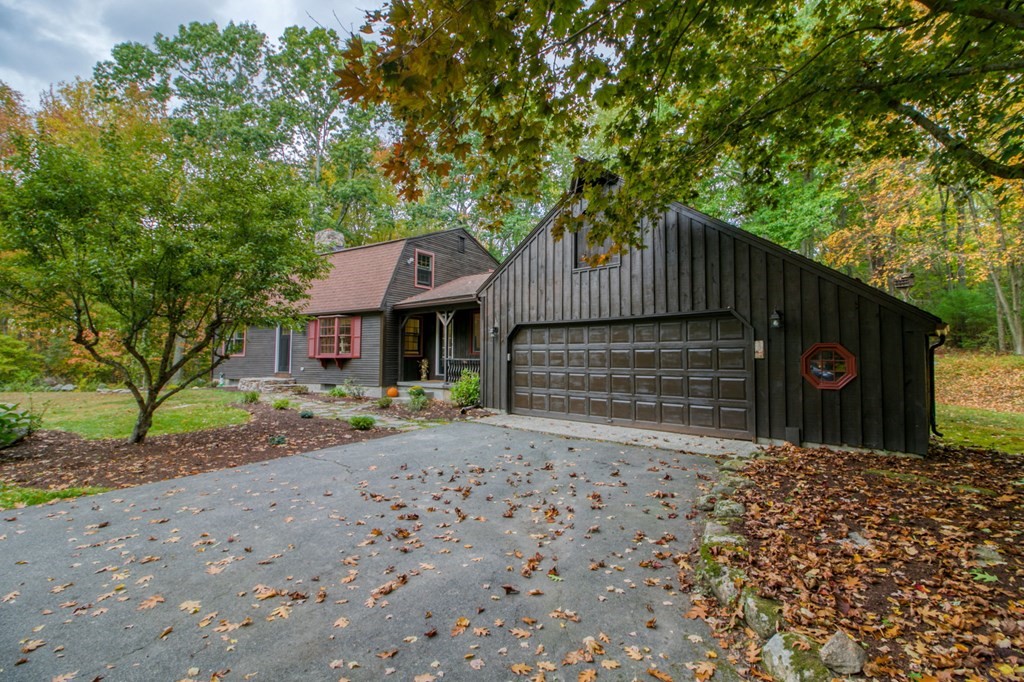27 Thayer Road Monson, MA 01057 - Photo 3 of 39 a front view of a house with garden
