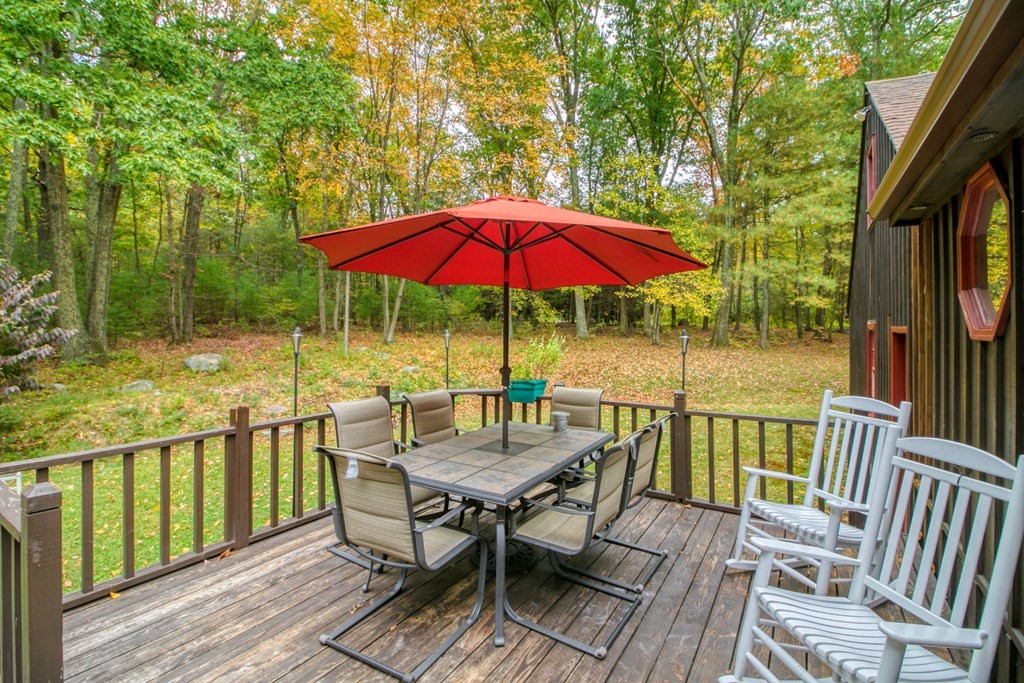 27 Thayer Road Monson, MA 01057 - Photo 34 of 39 a view of balcony with wooden floor and outdoor seating