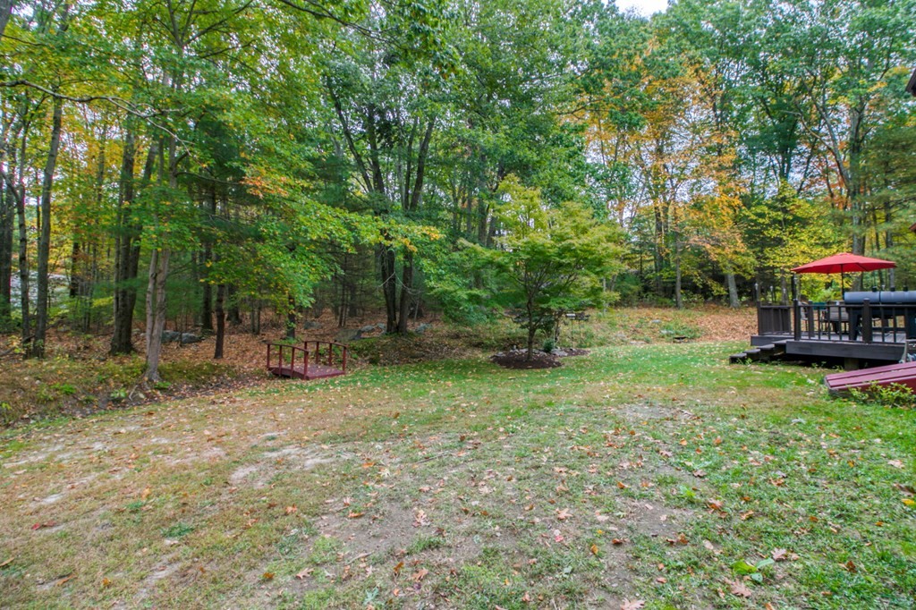 27 Thayer Road Monson, MA 01057 - Photo 38 of 39 a view of a house with backyard