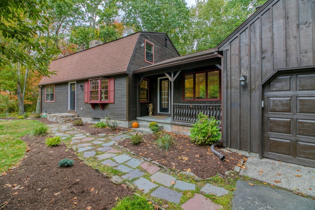 27 Thayer Road Monson, MA 01057 - Photo 4 of 39 a front view of a house with garden