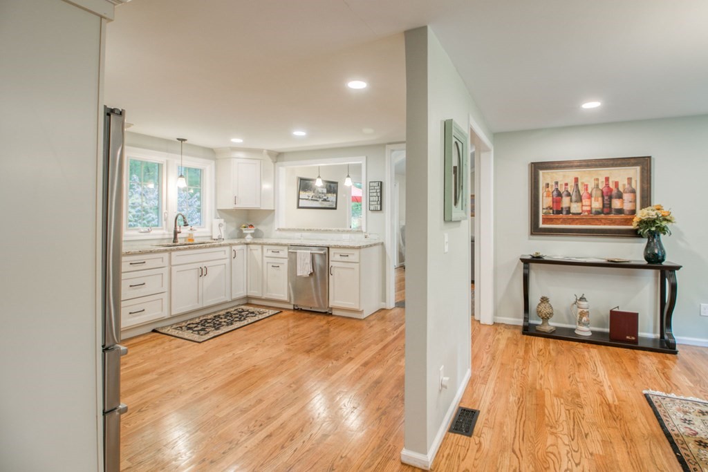 27 Thayer Road Monson, MA 01057 - Photo 7 of 39 a open kitchen with stainless steel appliances granite countertop a stove and a refrigerator