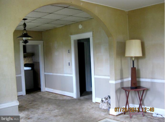 512 Back River Neck Road Essex, MD 21221 - Photo 19 of 28 Living Room through arch to D.R.