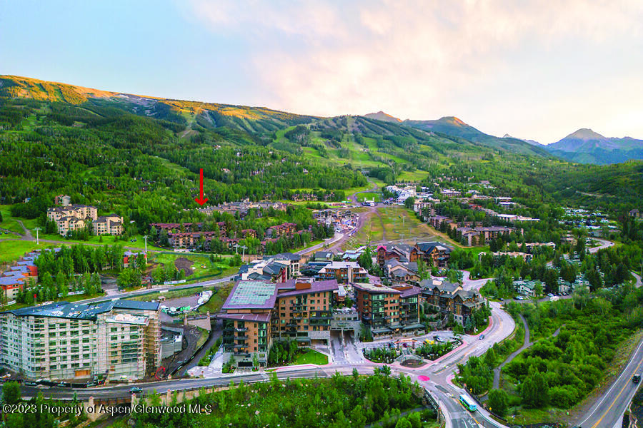 425 Wood Road, Unit 6 Snowmass Village, CO 81615 - Photo 2 of 29 an aerial view of residential house and car parked on street side