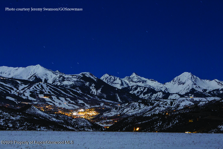 425 Wood Road, Unit 6 Snowmass Village, CO 81615 - Photo 23 of 29 a bed sitting in a bedroom next to a bed