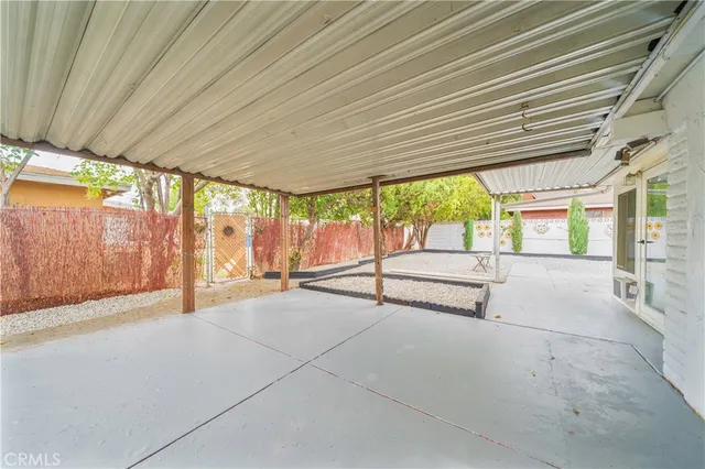a view of an empty room with a sliding door