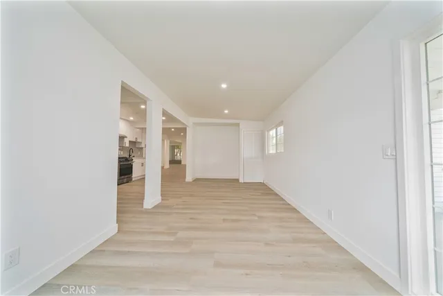 a view of an empty room and window