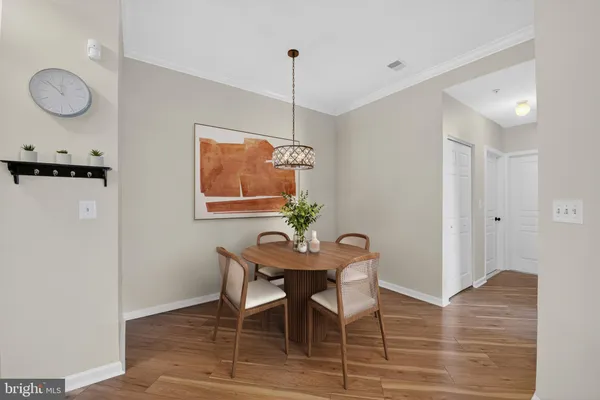 a view of a dining room with furniture