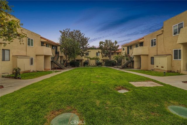 a house view with a outdoor space